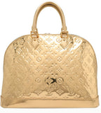 Preowned Authentic Louis Vuitton Gold Alma Handbag