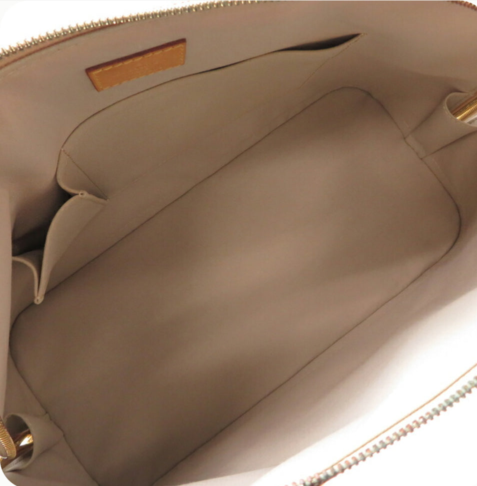 Preowned Authentic Louis Vuitton Gold Alma Handbag