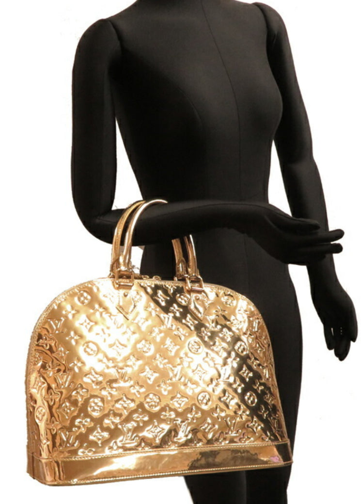 Preowned Authentic Louis Vuitton Gold Alma Handbag