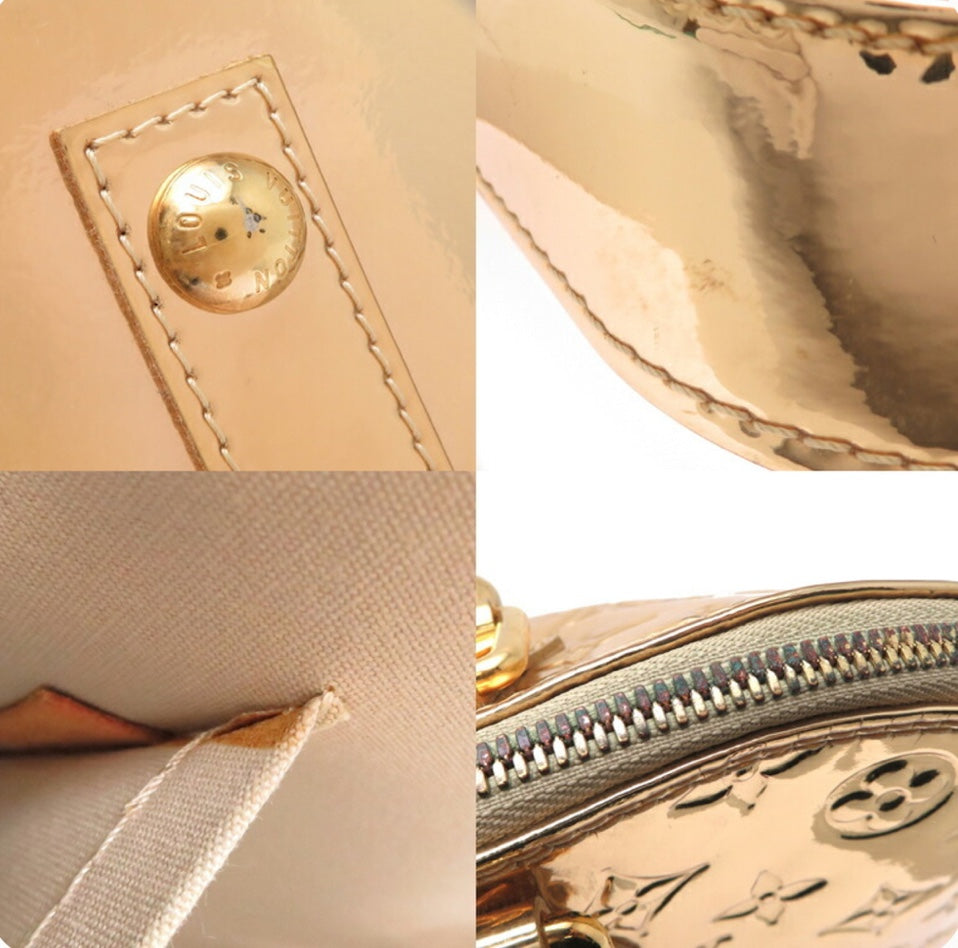 Preowned Authentic Louis Vuitton Gold Alma Handbag