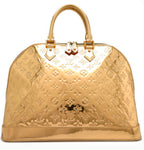 Preowned Authentic Louis Vuitton Gold Alma Handbag