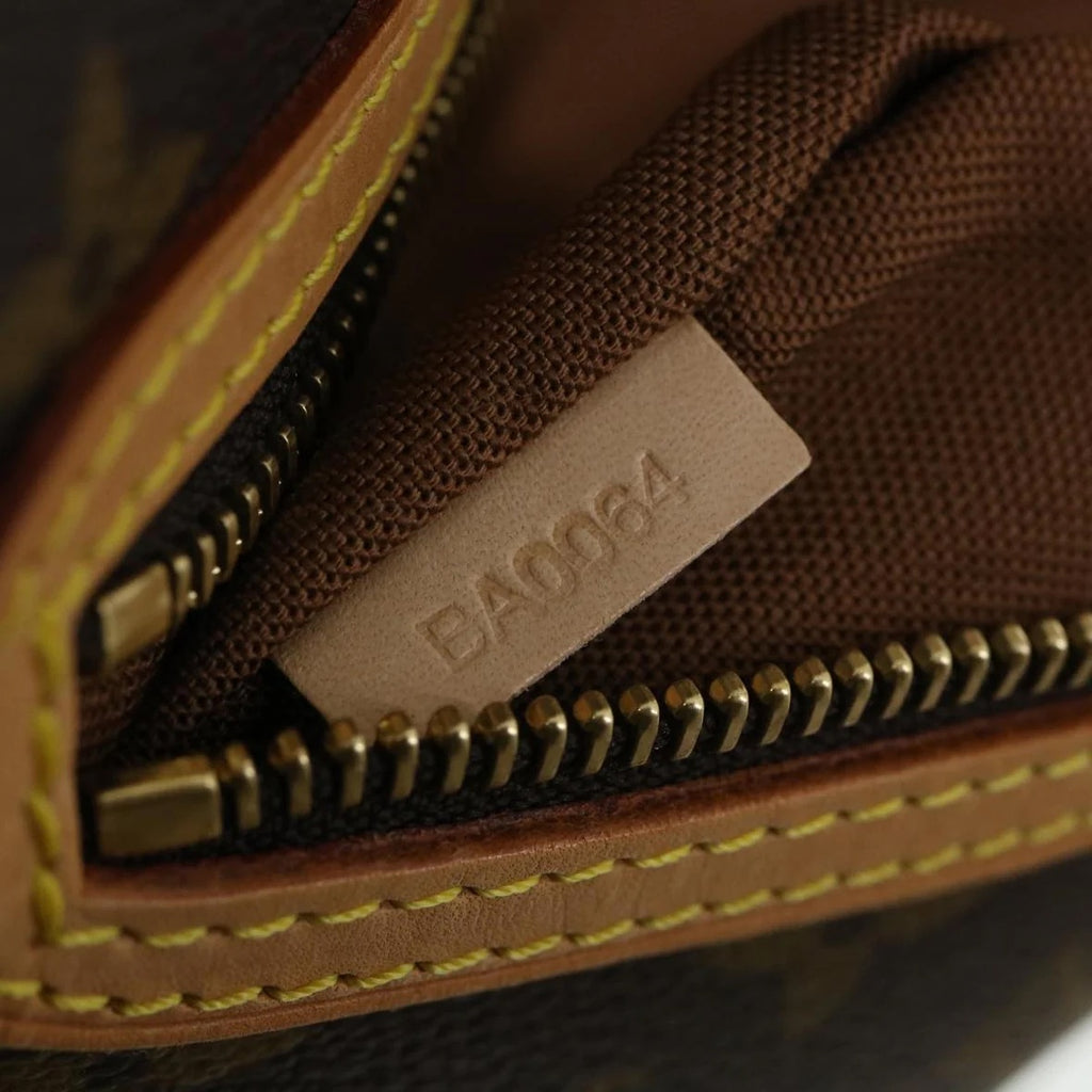 Preowned Authentic Louis Vuitton Monogram Alma Voyage GM Boston Bag